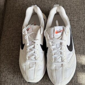 Nike women’s White Sneakers with Black Swoosh